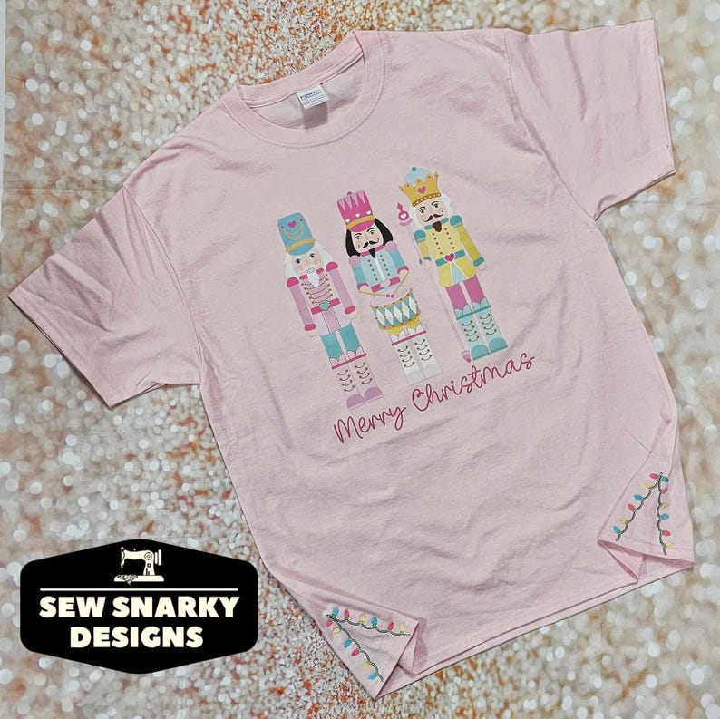 Pastel Nutcracker Christmas T-Shirt with Embroidered Christmas Lights - Side Slit Detail Embroidery - Pastel Christmas