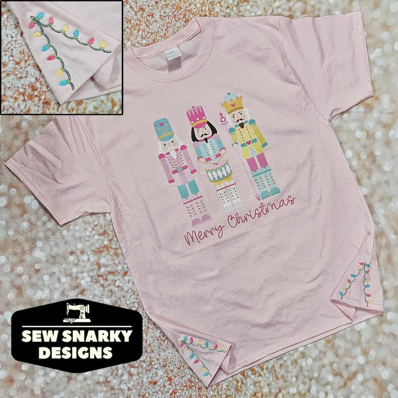 Pastel Nutcracker Christmas T-Shirt with Embroidered Christmas Lights - Side Slit Detail Embroidery - Pastel Christmas