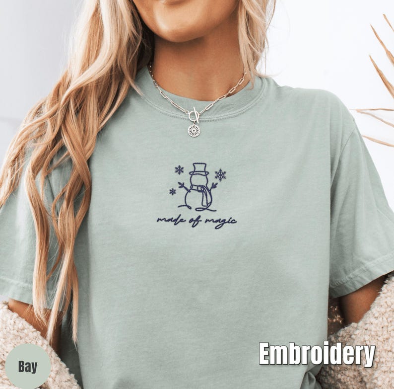 Embroidered Christmas Snowman Shirt, Comfort Colors Made of Magic Minimalist Tee, Cute Winter Embroidery, Cozy Holiday Gift Shirt