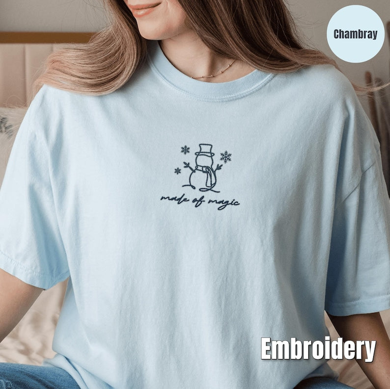 Embroidered Christmas Snowman Shirt, Comfort Colors Made of Magic Minimalist Tee, Cute Winter Embroidery, Cozy Holiday Gift Shirt