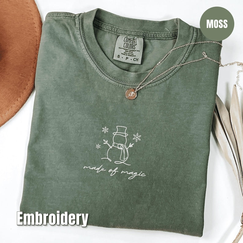 Embroidered Christmas Snowman Shirt, Comfort Colors Made of Magic Minimalist Tee, Cute Winter Embroidery, Cozy Holiday Gift Shirt