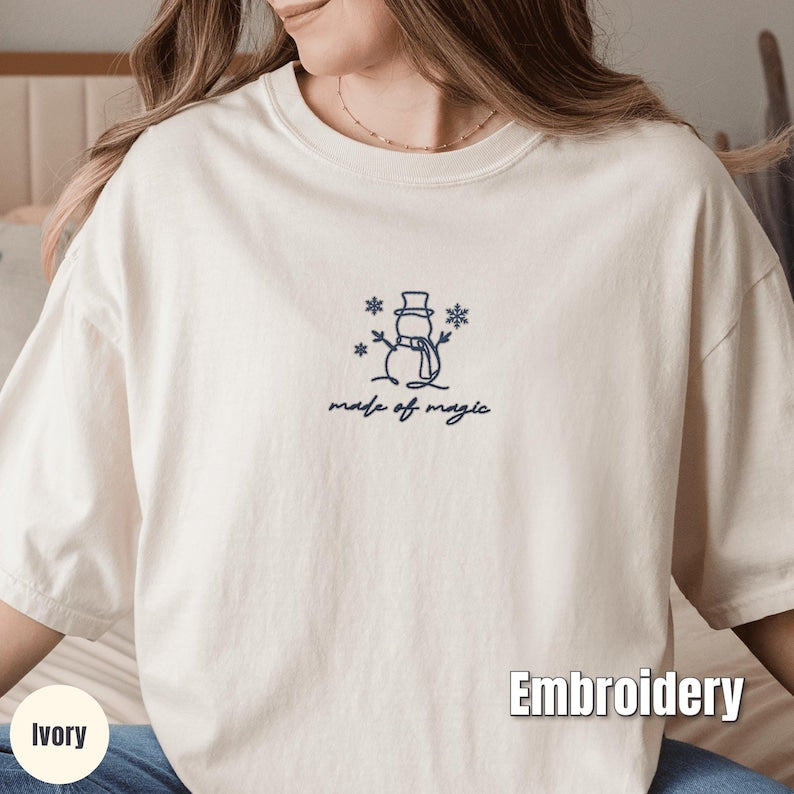 Embroidered Christmas Snowman Shirt, Comfort Colors Made of Magic Minimalist Tee, Cute Winter Embroidery, Cozy Holiday Gift Shirt