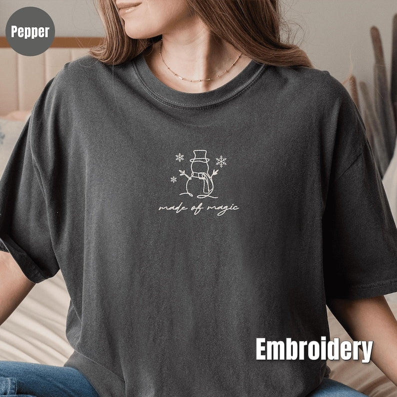 Embroidered Christmas Snowman Shirt, Comfort Colors Made of Magic Minimalist Tee, Cute Winter Embroidery, Cozy Holiday Gift Shirt