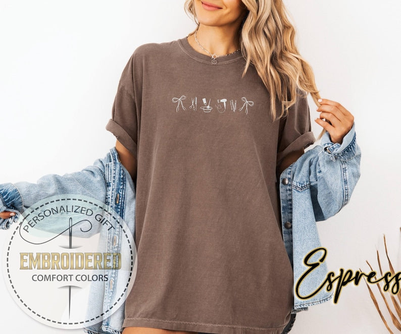 Embroidered Hair Stylist Icons Shirt, Comfort Colors T-shirt, Hairstylist Shirt, Salon Professional Gift, Ribbon Bow Scissors Dryer Tee