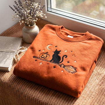 Embroidered Black Cat Broomstick Sweatshirt – Cozy Halloween Apparel