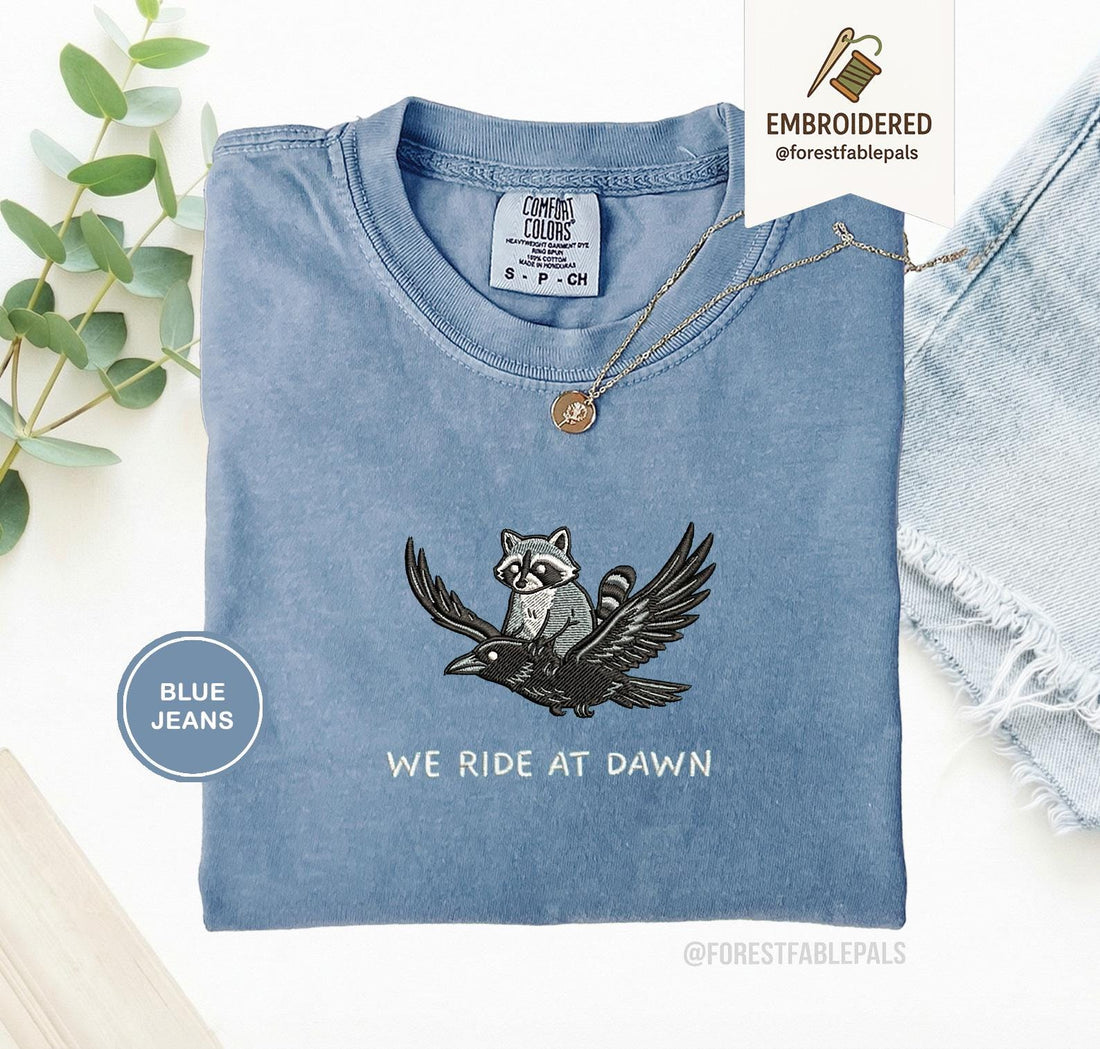 We Ride at Dawn T-Shirt, Funny Raccoon and Crow Raven Tee, Embroidered Comfort Colors 1717, Chaotic Animal Shirt, Whimsical Gamer Gift
