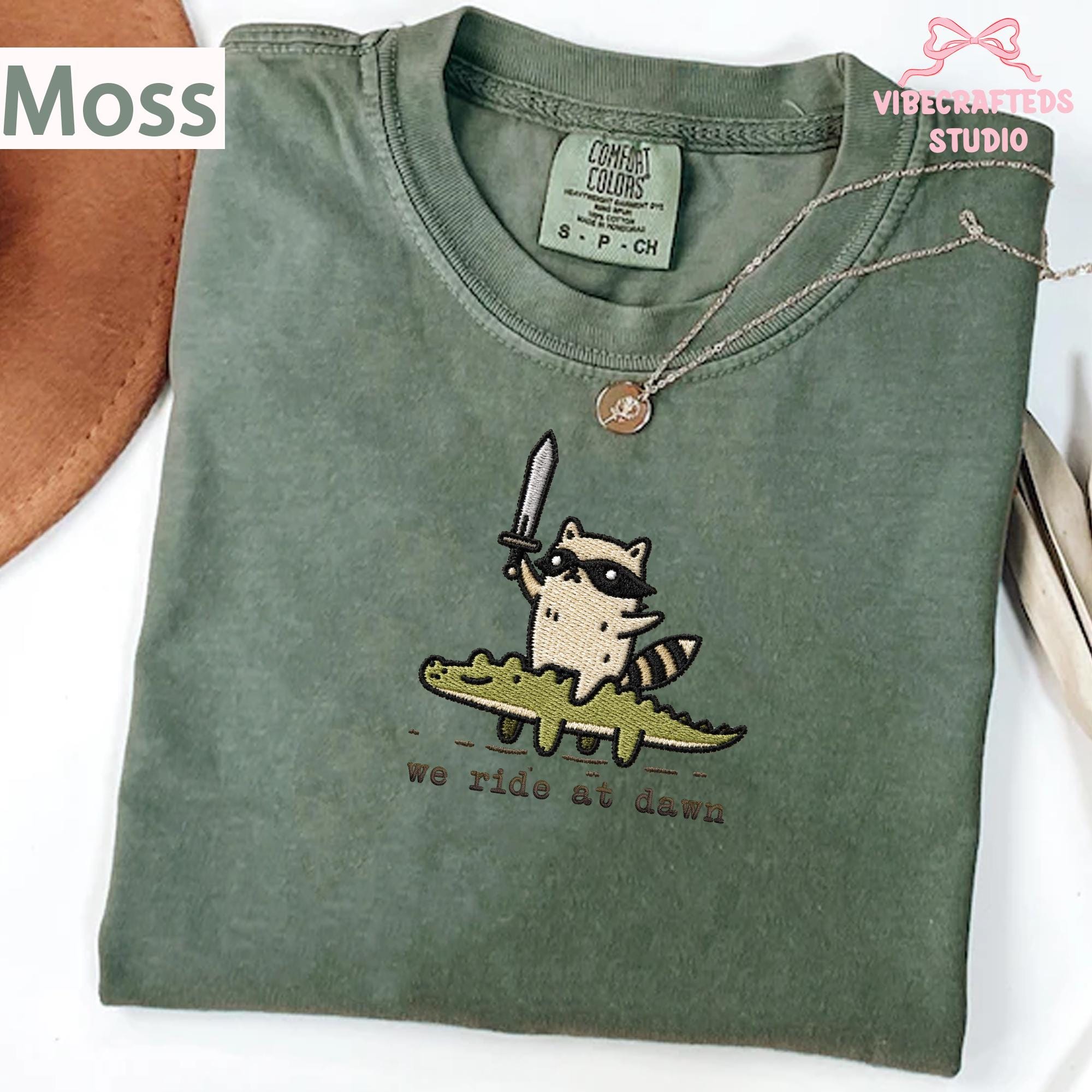 We Ride At Dawn Embroidered Raccoon Shirt, Funny Trash Panda Comfort Colors Tee