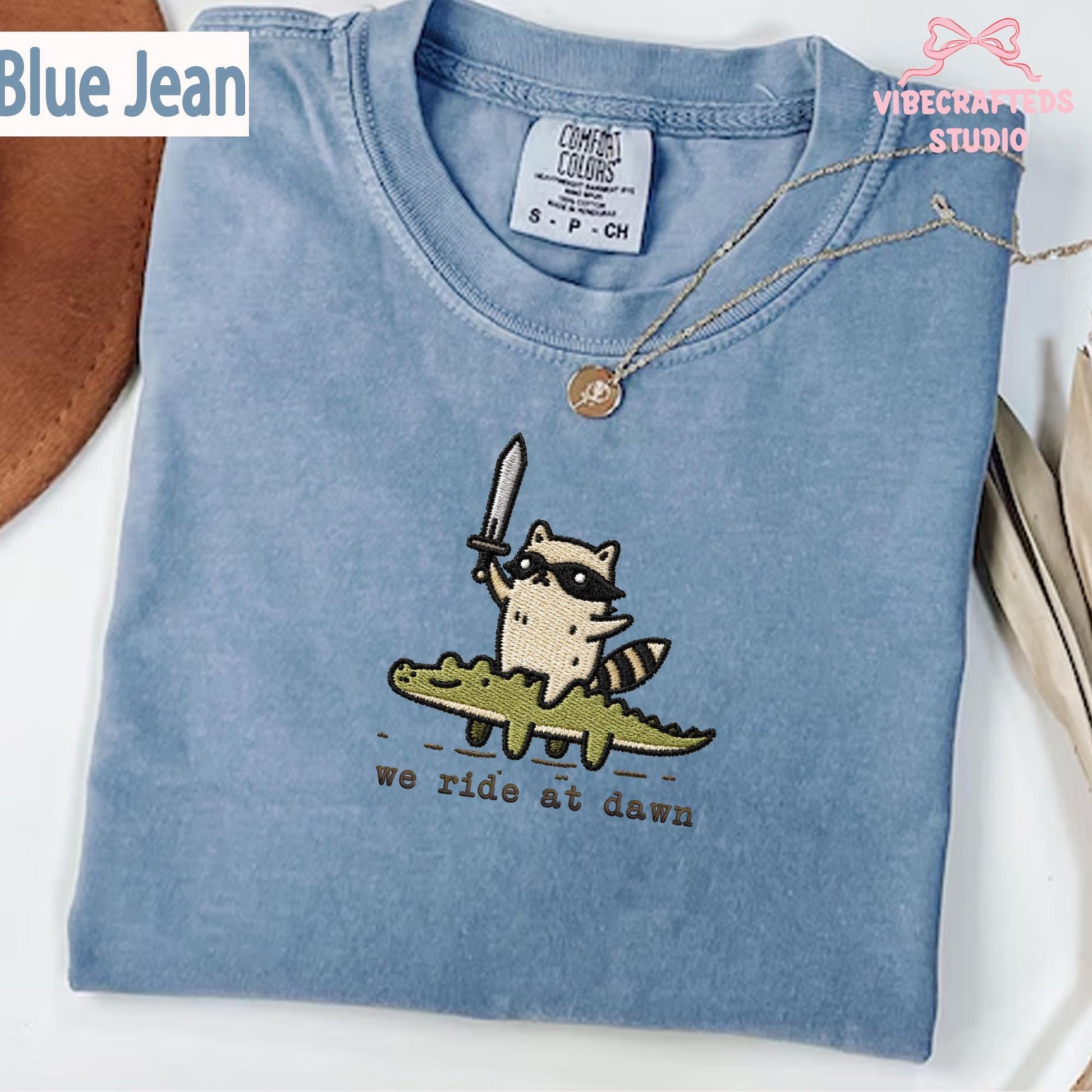 We Ride At Dawn Embroidered Raccoon Shirt, Funny Trash Panda Comfort Colors Tee